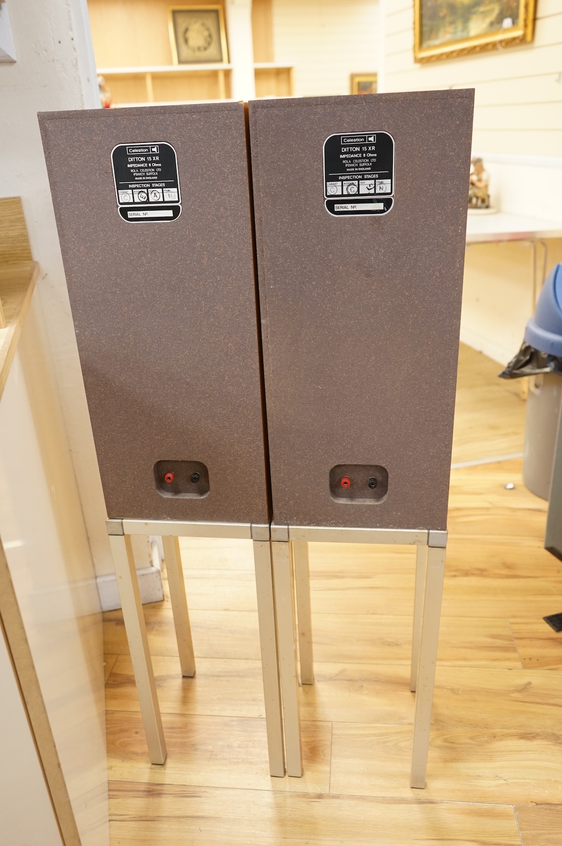 A pair of Celestion Ditton 15XR stereo speakers attached to stands, speakers; 56cm high, 25cm wide, 24cm deep, overall height including the stands 110cm.